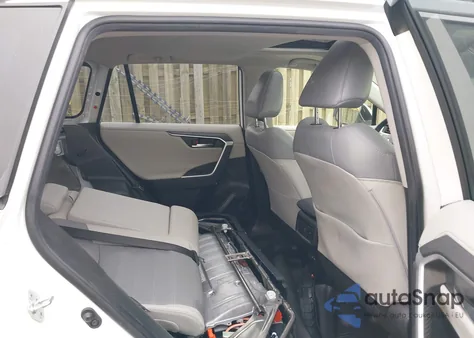 2023 Toyota Rav4 Hybrid Limited from USA, damaged, VIN JTMD6RFV6PD088661